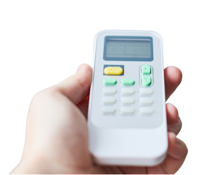 Hand holding an air conditioner remote control to operate ductless mini split AC installed by Purcell Heating and Air Ltd in Calgary