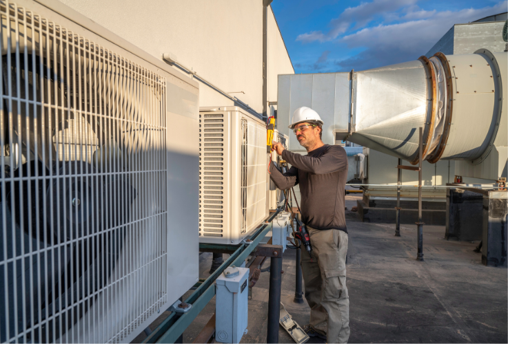 Purcell Heating and Air Ltd technician performing commercial HVAC & Furnace Repair Services in Calgary