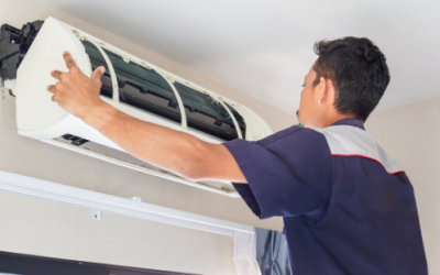 Calgary air conditioning replacement project with Purcell Heating and Air Ltd technicians installing a new system